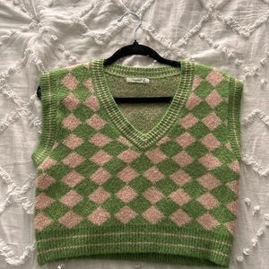 The cropped knit sweater vest